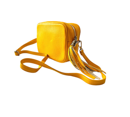 sac pompon jaune en cuir